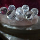 天然ピンクの水晶七星の版が付いている天然白いの水晶球の七星の配列
